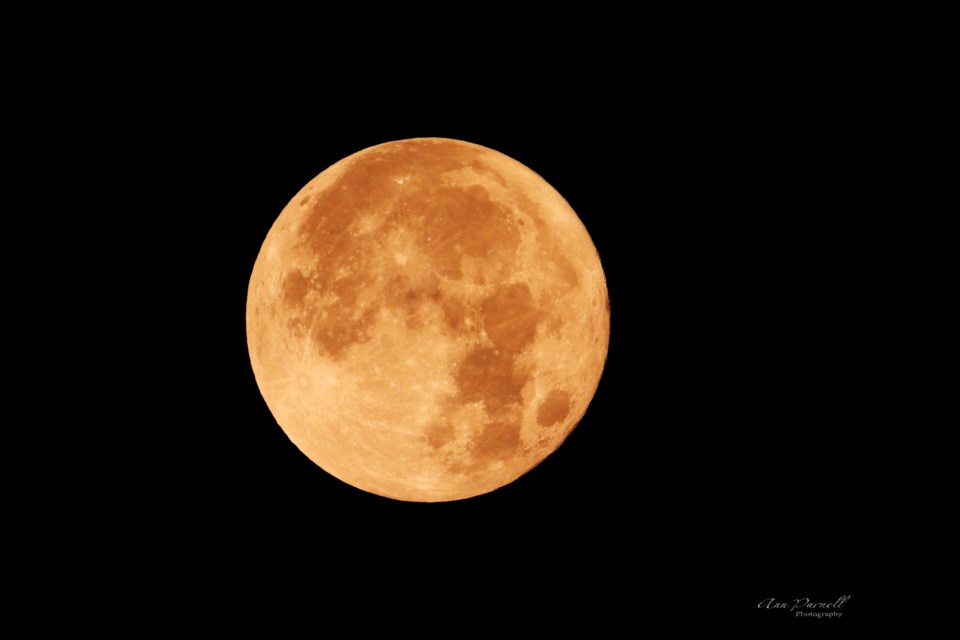 Ann Parnell took this photo of the Aug. 30 super blue moon from her balcony in Timmins.