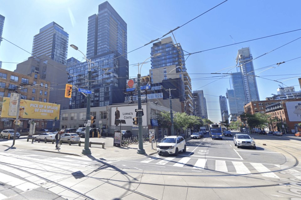 Recent view of parking lot at corner of Spadina and Adelaide