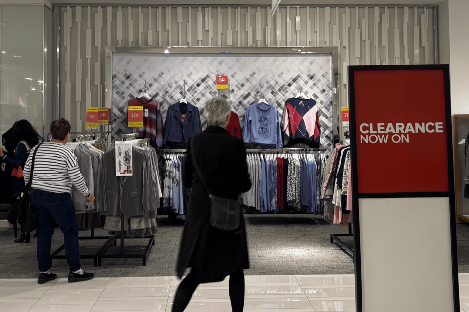 Shoppers browse the racks inside Hudson's Bay at the Eaton Centre.