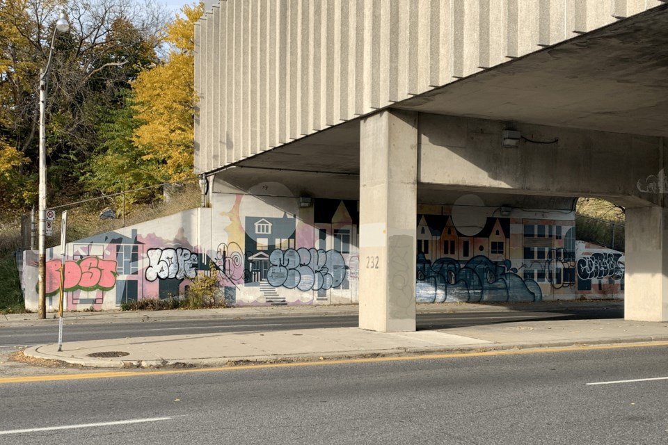 The wall near the UP Bloor Station has long been riddled with graffiti, one of several areas the nearby BIA has been communicating with the city to clean up.