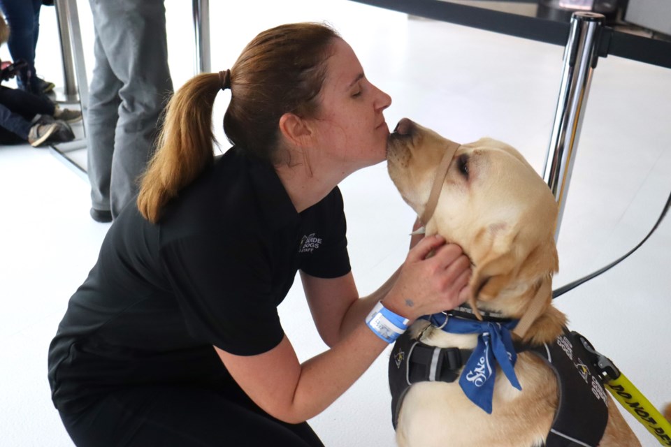 Visually impaired resident Larissa Proctor had an adorable reunion with her guide dog Jim after she completed the 44th annual CN Tower Climb in support of United Way Greater Toronto on Sunday.