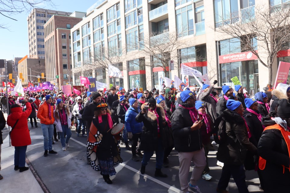 Achievements were celebrated and demands for more action were made at International Women's Day march in Toronto.