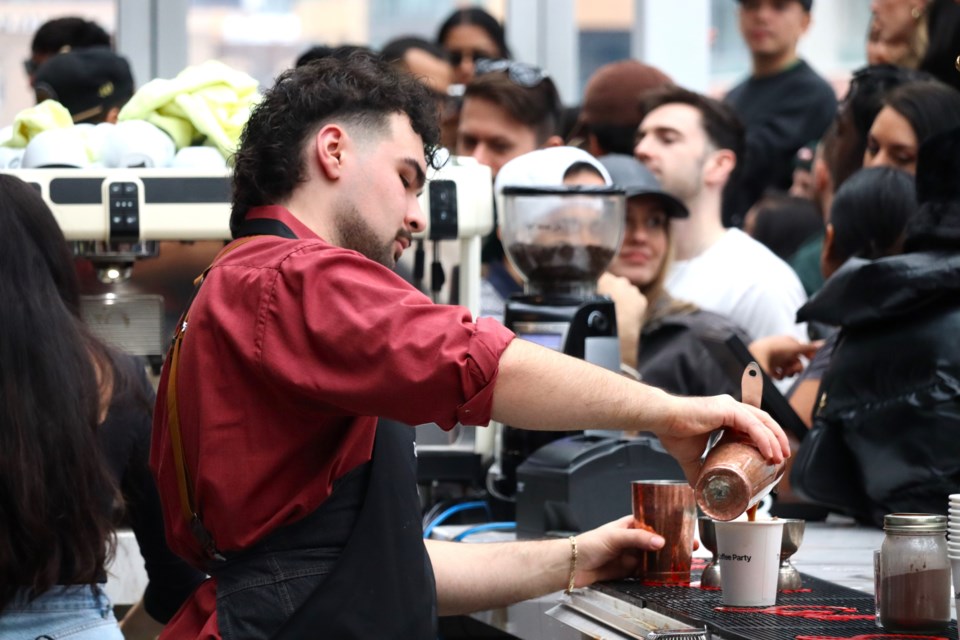 A barista serves up specialty caffeinated drinks at The Coffee Party on Jan. 25, 2025.