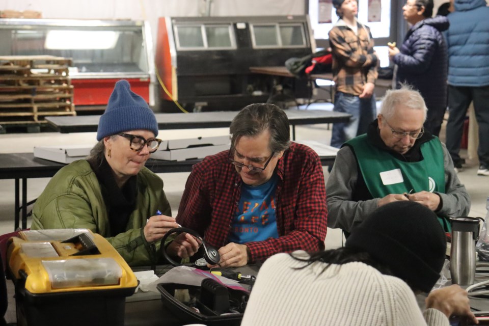 Volunteers with Repair Café Toronto were at St. Lawrence Market on Thursday.