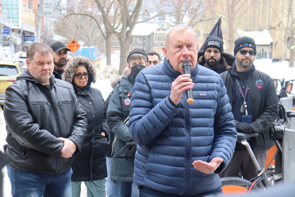 Ontario Council of Hospital Unions president Michael Hurley voiced his displeasure with health-care cuts at St. Michael's Hospital on Monday.