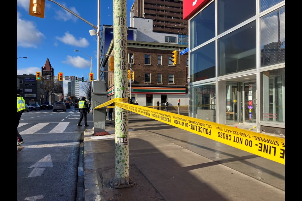 Police tape blocks off scene where man was found wounded near Bloor Street West and Madison Avenue. He was pronounced dead in hospital.