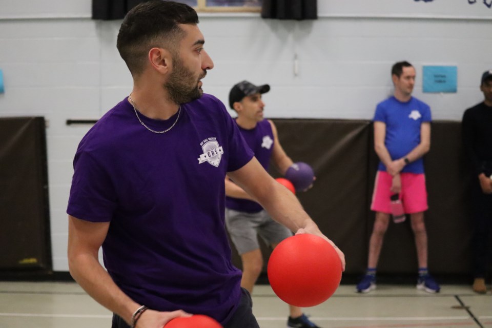 Scenes from Little League action during a Gay Ball Society dodgeball game at Church Street Public School.