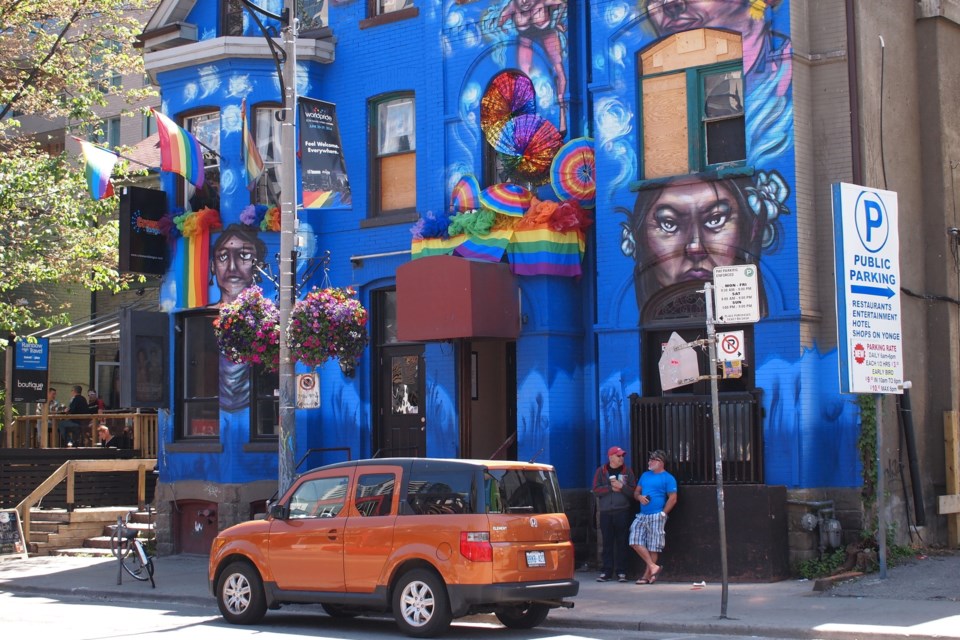 Building's large exterior mural was painted as part of the 2014 Church Street Mural Project in celebration of World Pride.  