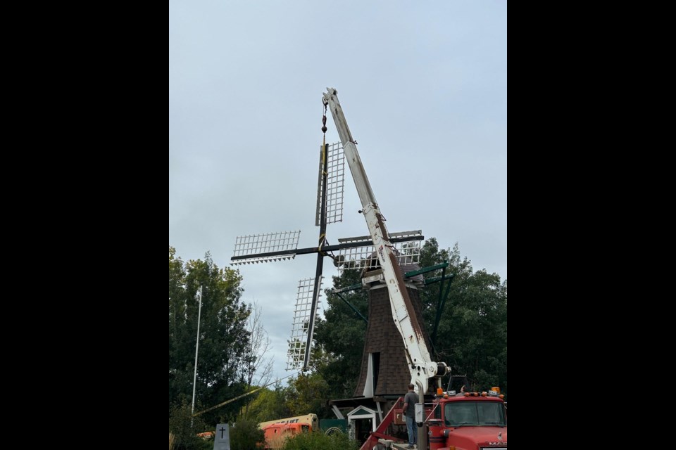 The sails of the windmill replica are loaded by crane on the truck for transporting to its new home in Neerlandia on Sept. 21. Photo supplied by Lambert Veenstra.  