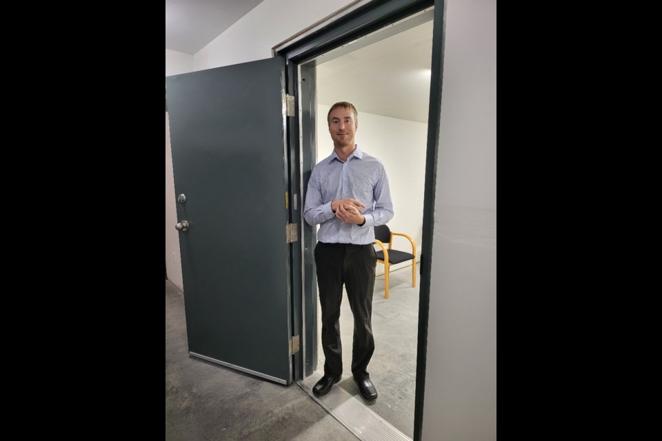 Brant C. De Rudder, Barrister and Solicitor stands in the Will bunker in the new Driessen De Rudder Law Office at the Open House on Oct. 18