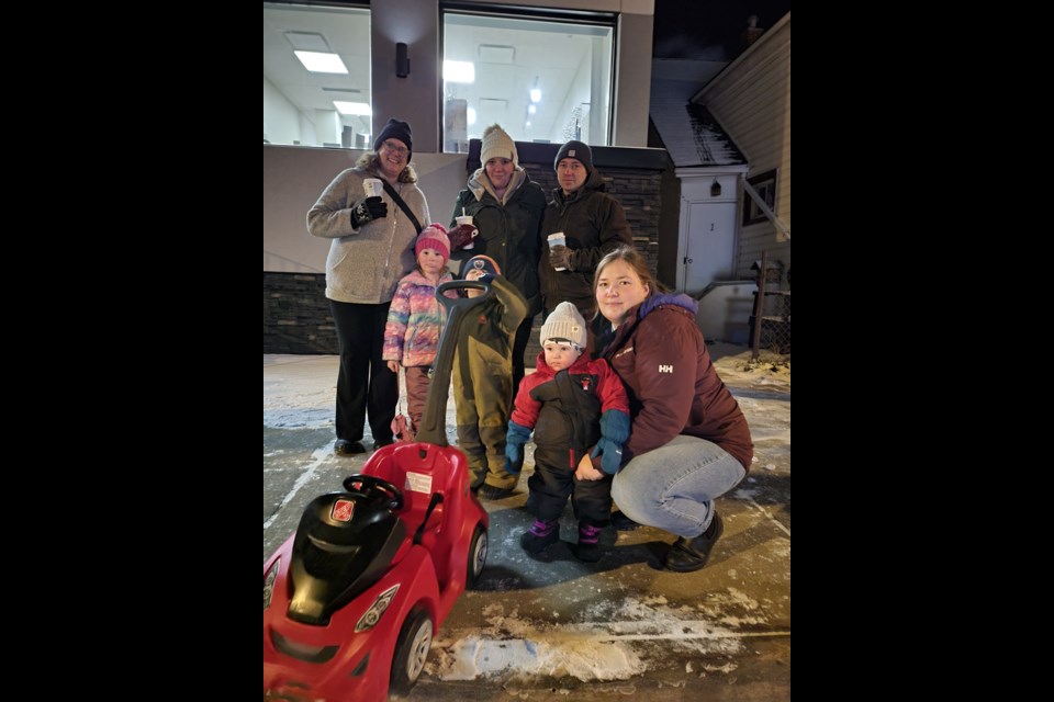 Levi (1), Benjamin(3),  Samantha, and Linelle Seskus, Brittany Fletcher, and Aayla(5) and Andrew Cullihall waited patiently in the -16 degrees weather for the parade to start.