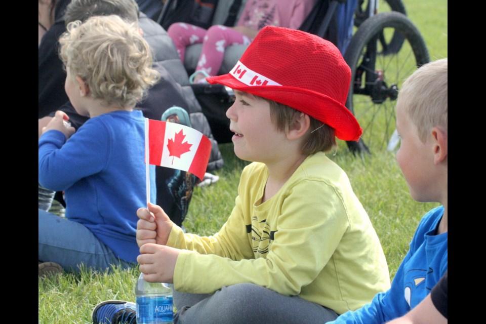 Benjamin Cheladyn shows his love for Canada, while watching one of two dog shows July 1, in Westlock as part of the town's Canada Day festivities.   