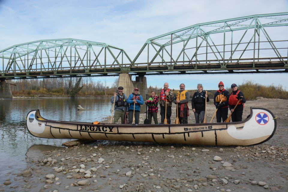 Legacy Voyager Canoe Paddlers beside the Fort Assiniboine bridge over the Athabasca River- L-R Matt Webber,Rick Zrobak, Colleen Kiselyk, Councillor Peter Kuelken,  Dan Moore, Petra Rowell, Illo Harpe and Teresa Olson on Oct. 7.   Phot provided by Les Dunford.    