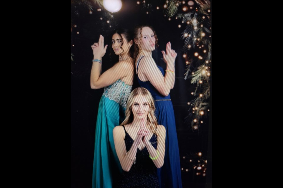 RF Staples High School Frosty Formal on Dec. 20 was a big hit. Jenna St. Louis (Center), Katrina Monro (left), Zoe McLean (right) Photo Supplied. 