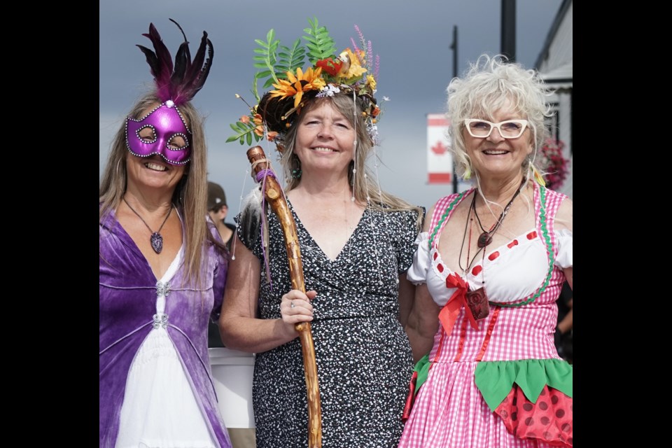               Organizers are hailing the annual Boyle Boyle Wildberry Festival, which ran Aug. 11-12, another big success and estimating a 1,000-plus people took part. The event included a parade, plus a variety of family-fun events over the weekend. Dressed to impress, Vireo Karvonen (left), Lisa Hyde (centre) and Terry Mudryk (right) embodied the spirit of the festival through vivid costuming Aug. 12.                 