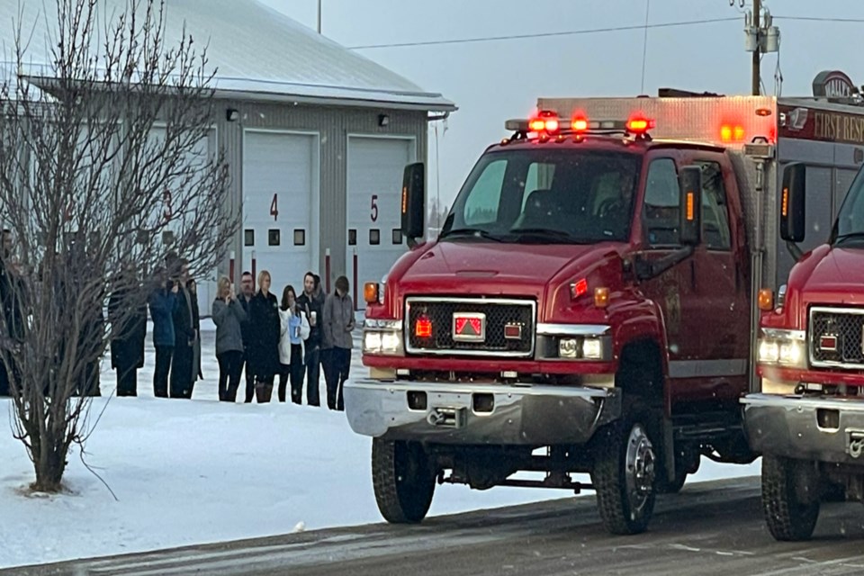 The Pysyk family gathered outside their home, right beside patriarch John’s beloved fire department Dec. 7, to watch a drive-by salute that included fire departments Grassland, Boyle, and Wandering River, three RCMP, a sheriff, and EMTs. Parkland 911 dispatch also announced last call over the radio.