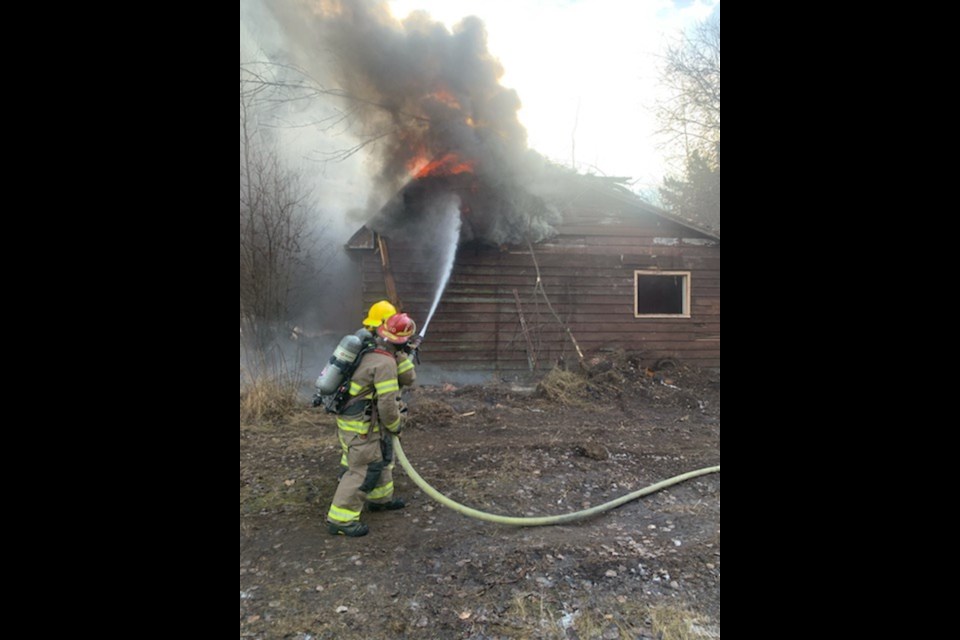 Firefighters from the Barrhead Regional Fire Services and the Fort Assiniboine Fire Department teamed up for a joint-training exercise on Nov. 16 which included the burning of the old Camp Creek general store.