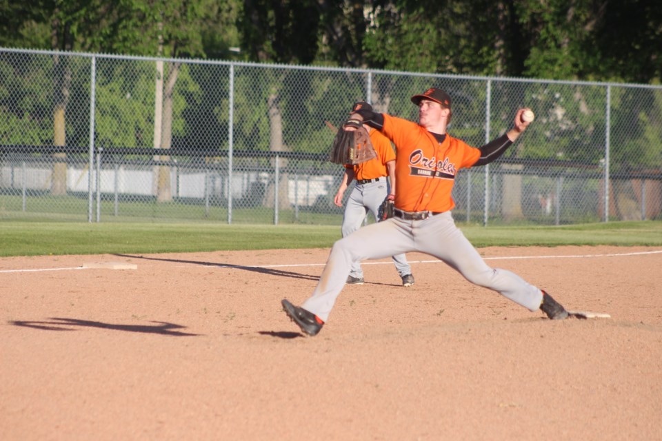 Barrhead Orioles governor and third baseman takes the mound in a June 19 game against St. Albert.