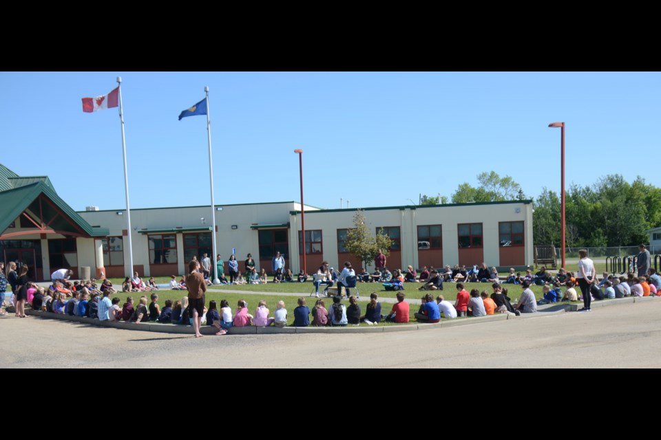 The students and staff at Eleanor Hall School in Clyde gathered in front of the building on June 21 to take part in a drum circle organized for National Indigenous Peoples' Day. The event was thrown together at the last minute as the drummers stopped at the school on their way to other events.
PHOTO SUBMITTED