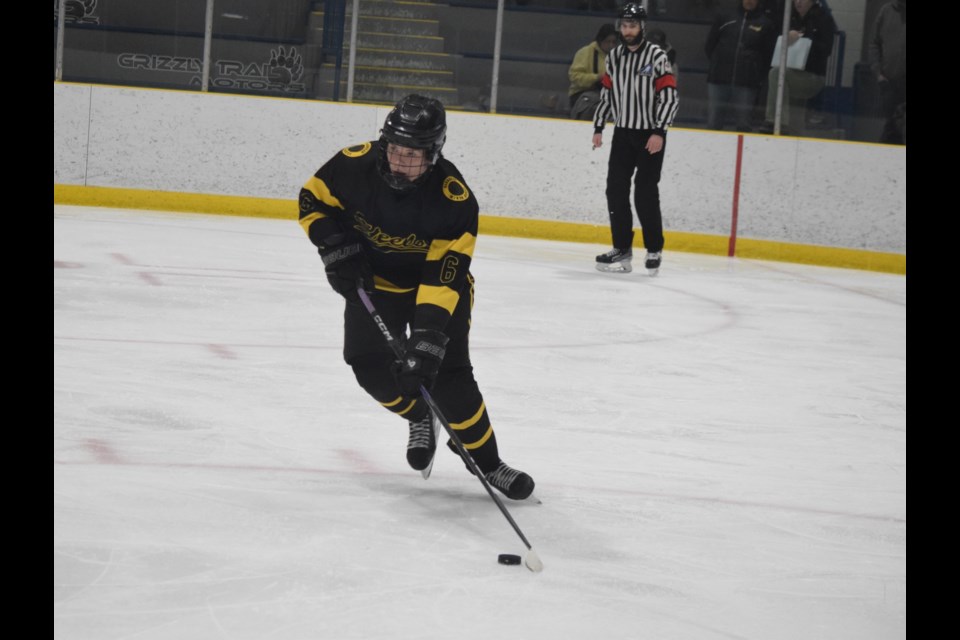 Barrhead Steeler Cohen Fisher carries the puck out of his own zone in the second period of a Jan. 11 home game against Edson.