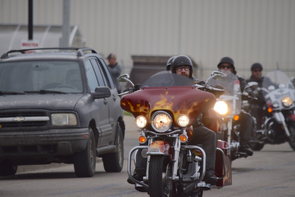 Don Smith leads out riders copy-motorcycle ride advancer