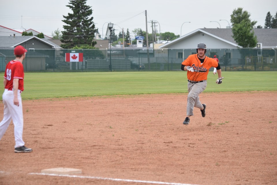 Barrhead Orioles' first baseman Kyle Stoik rounding third in the first inning.