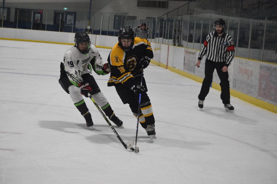 Barrhead Renegade Layne Young powering past his Plamondon rival.