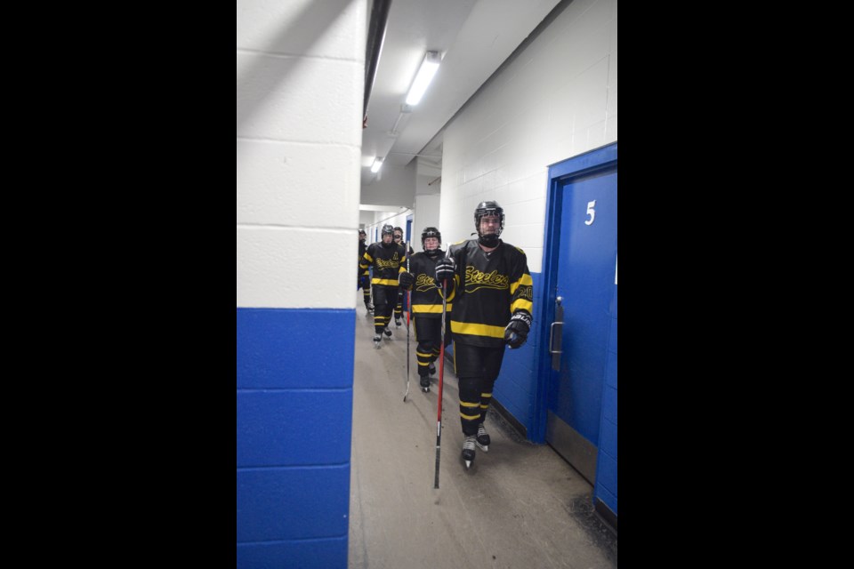 Levi DeVries leads the Steelers back to their dressing room after they defeated Wainwright for the second straight game in a NEAHL playoff game.