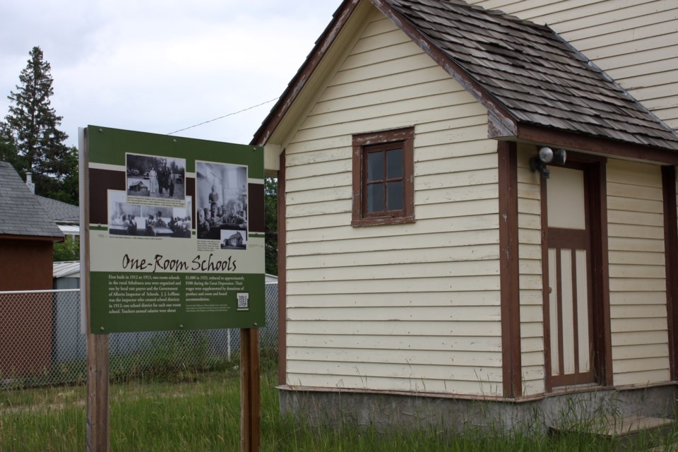 The new information sign recently installed by the Athabasca Heritage Society outside of the West Athabasca School showing information on the history of the building itself and the other schools in the area at the time.