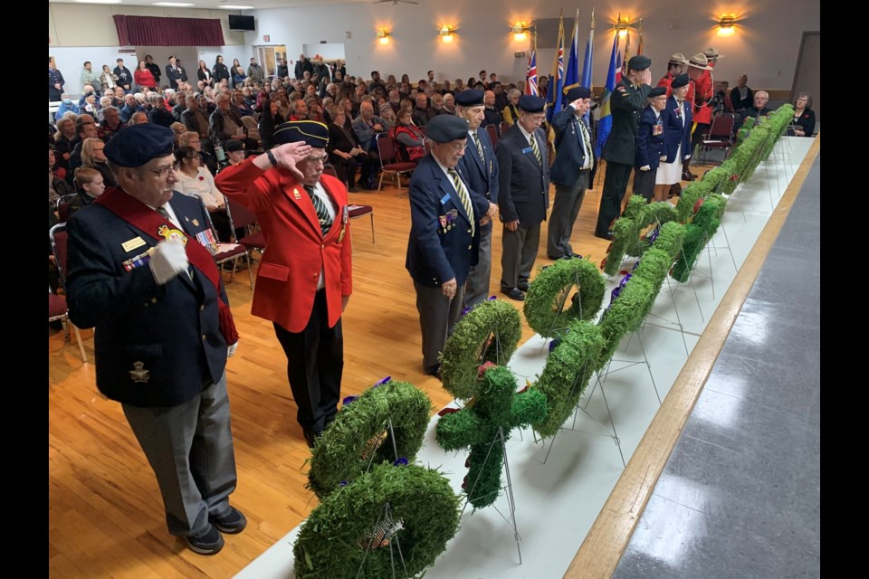 The Colour Party salutes during the Westlock Legion's Remembrance Day ceremony held at Memorial Hall Nov. 11.