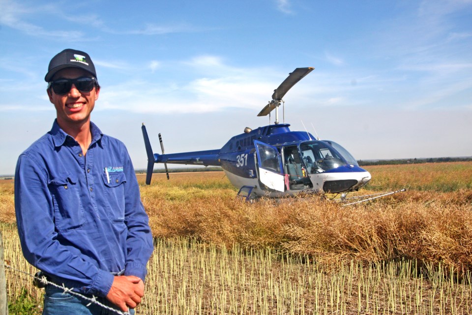 Chopper pilot George Graham from Australia is in Alberta spraying crops in Westlock County. 