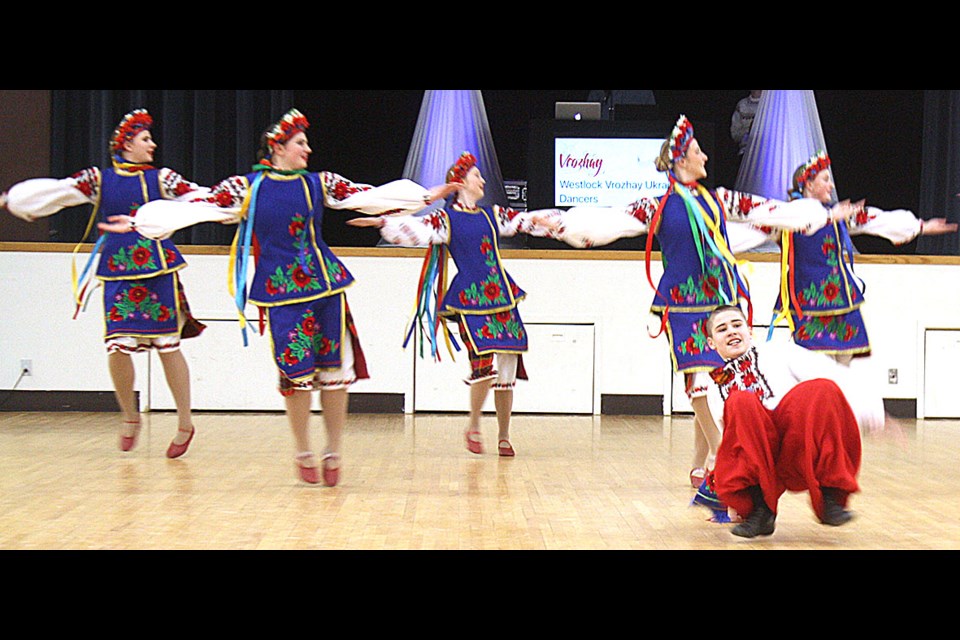 Delighting the crowd at the Westlock Community Hall on Jan. 18 for Malanka 2025 were from left, Natalie Hahn, Jacquie Safar, Sophie Cameron, Jaclyn Hahn, Emmerson Bowzaylo , and in the front,  Jesse Burritt. They are from the Athabasca Ukrainian Folk Dance Club.