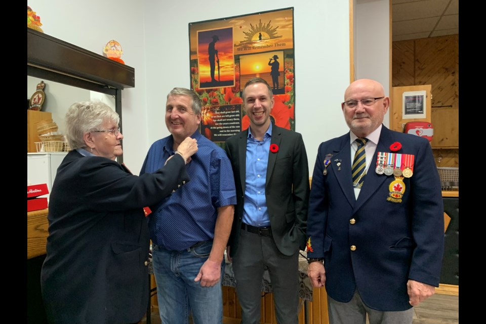 The Westlock Legion Branch #97 kicked off its Poppy Campaign at the legion on Oct. 25. Town of Westlock Mayor Jon Kramer and Westlock County Deputy-Reeve Ray Marquette receiving the first poppies. Pictured from left are Marjorie Steele, Westlock Legion Chaplain, Westlock County Deputy Reeve Ray Marquette, Town of Westlock Mayor Jon Kramer, and Wayne Inkpen, Westlock Legion V. P. and Membership Chairman