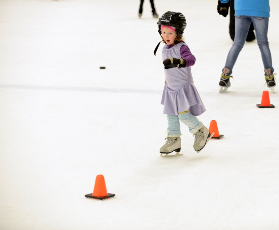 Piper Dosenberg, age 3, is in her first year of learning how to skate. She practiced her moves around the pylons. The whole Dosenberg family attended the Family Day public