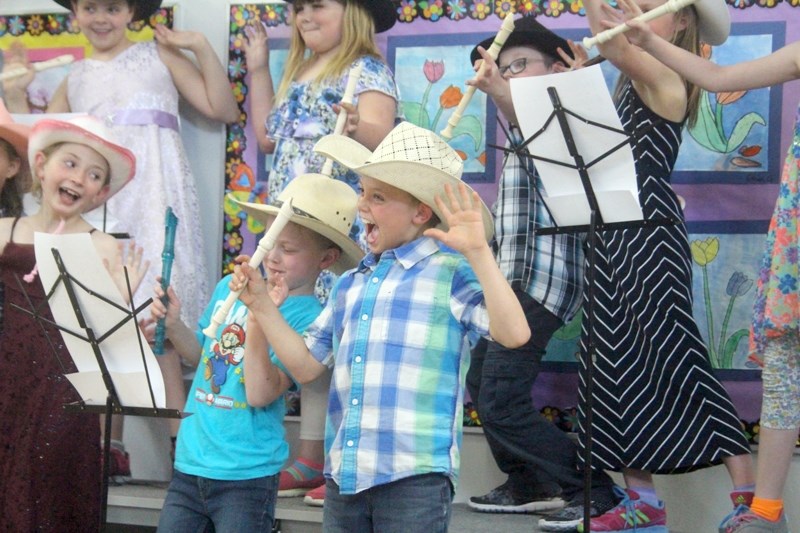 Grade 3/4 students at Dunstable perform &#8220;Cowboy Song&#8221; as part of the spring tea entertainment. Pictured include (Front Row L-R): Jaide Abrams-Masterson, Dylan