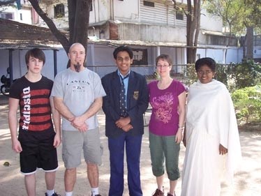 We are family: Kunal (centre) is flanked by, from the left, Chad, Randy and Irene Lavallee and school principal Miss Joyce. The Lavallees say their lives were changed by the