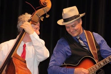 Double bass player Daniel Koulack and Woody Holler. Also see photo gallery at our website. www.barrheadleader.com.