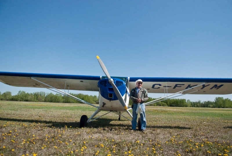 Larry Price arrived with a smile in his antique 1946 Taylor Craft. The plane, built with no electricity, starts in a way many may not expect: with the help of a D-Walt drill