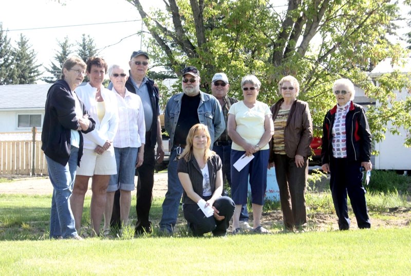 Town councillor Shelley Oswald (foreground) with Triangle Park residents Barb Callihoo, Cheryl Lefebvre, Jean and Robert Janssen, Alan Gaschnitz, Jim and Lorraine Matheway,