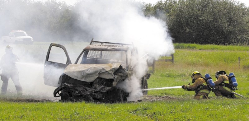 Truck engulfed in flames following crash - TownAndCountryToday.com