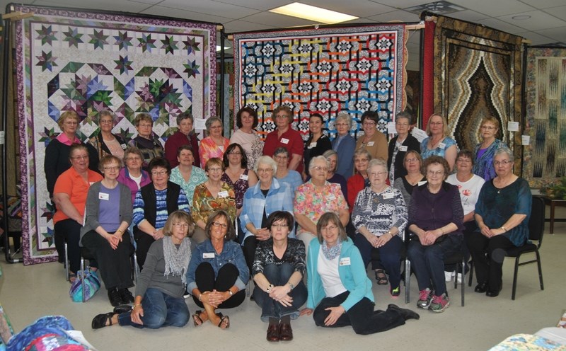 The Barrhead Country Quilters hosted their biennieal quilt show on April 23 to 25 at the Barrhead Seniors Drop-in Centre. Above the members of the Barrhead Country Quilters