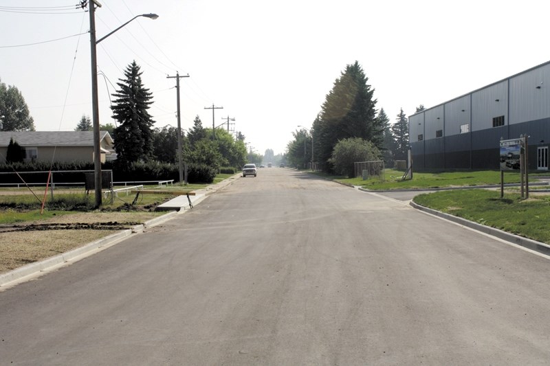 Looking east from the Spirit Centre parking lot, the gate blocking off 99 Street is clearly gone. Area residents want to know why they weren&#8217;t consulted about the