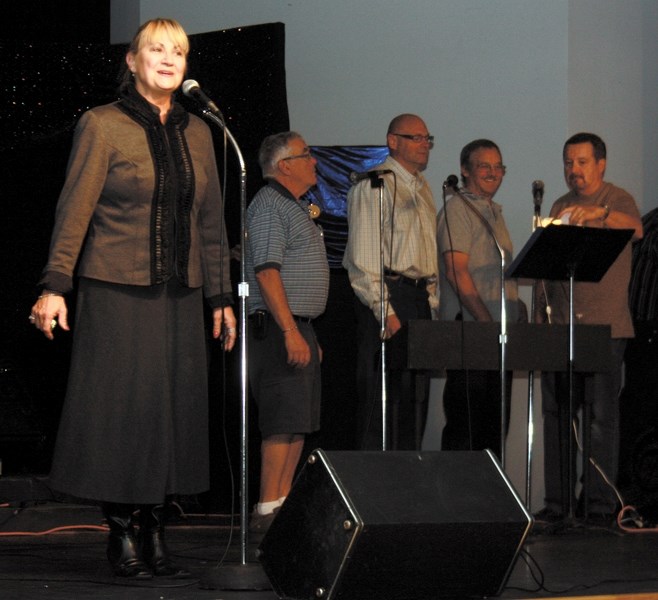 Terry Steiestol plays Patsy Cline, and is backed up the by The Jordanaires, Dave Lent (left), Ted Brooks, Vern Stocking and Brian Key for the Westlock Rotary Dinner Theatre’s 