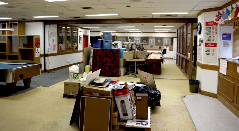 The contents of the Westlock Legion lounge sit in piles on the floor, waiting to be wrapped up before repairs begin in the coming weeks.