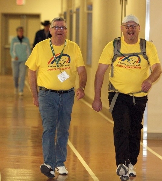 Jim Smith joined mayor Ralph Leriger March 18 (right) who wore a backpack with 50 pounds of weight for his 10-kilometre walk at the first-ever Sports for Ethopia fundraiser.