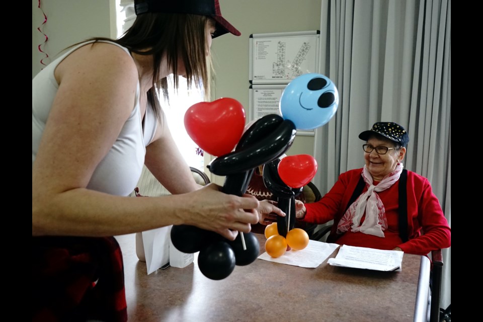 Residents at Pleasant Valley Lodge (PVL) were treated to a surprise courtesy of Athabasca’s Great Canadian Dollar Store this Valentine’s Day. Whitney Hollingsworth, PVL activities coordinator, handed out Balloon Buddies to Olga Ross and other seniors Feb. 14.                               