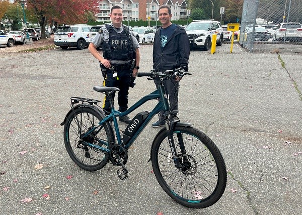 Ahmad Kharazmi (right) with Const. Scott Shaw of Coquitlam RCMP. 