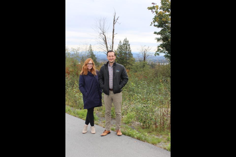 The City of Coquitlam's Tiina Mack and Curtis Scott, at the site for the proposed Northeast Community Centre — the anchor of the Burke Mountain Village.