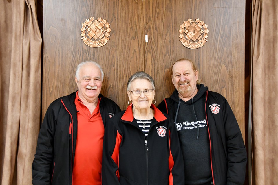 PoCo Kinsmen Walter and Bonnie Van Dimmelen, with Cyrille Barnabe (right), inside the Kinsmen Centre.