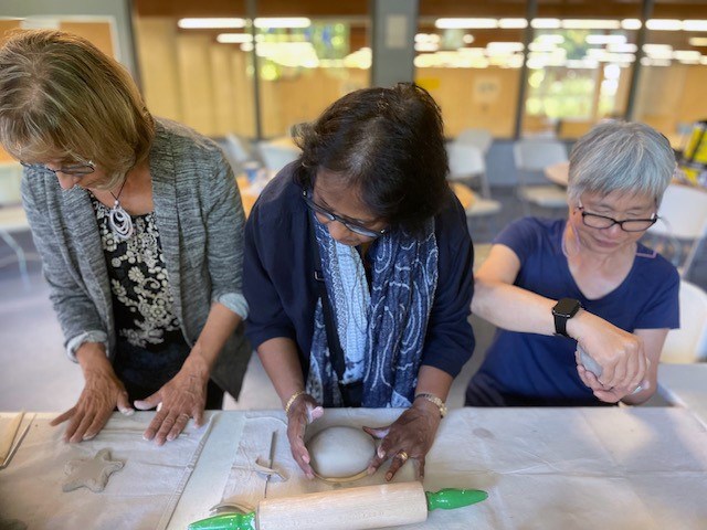 Seniors in Georgia Fitton's pottery-making workshop at the Port Moody Recreation Centre in June 2024 during Seniors Week.